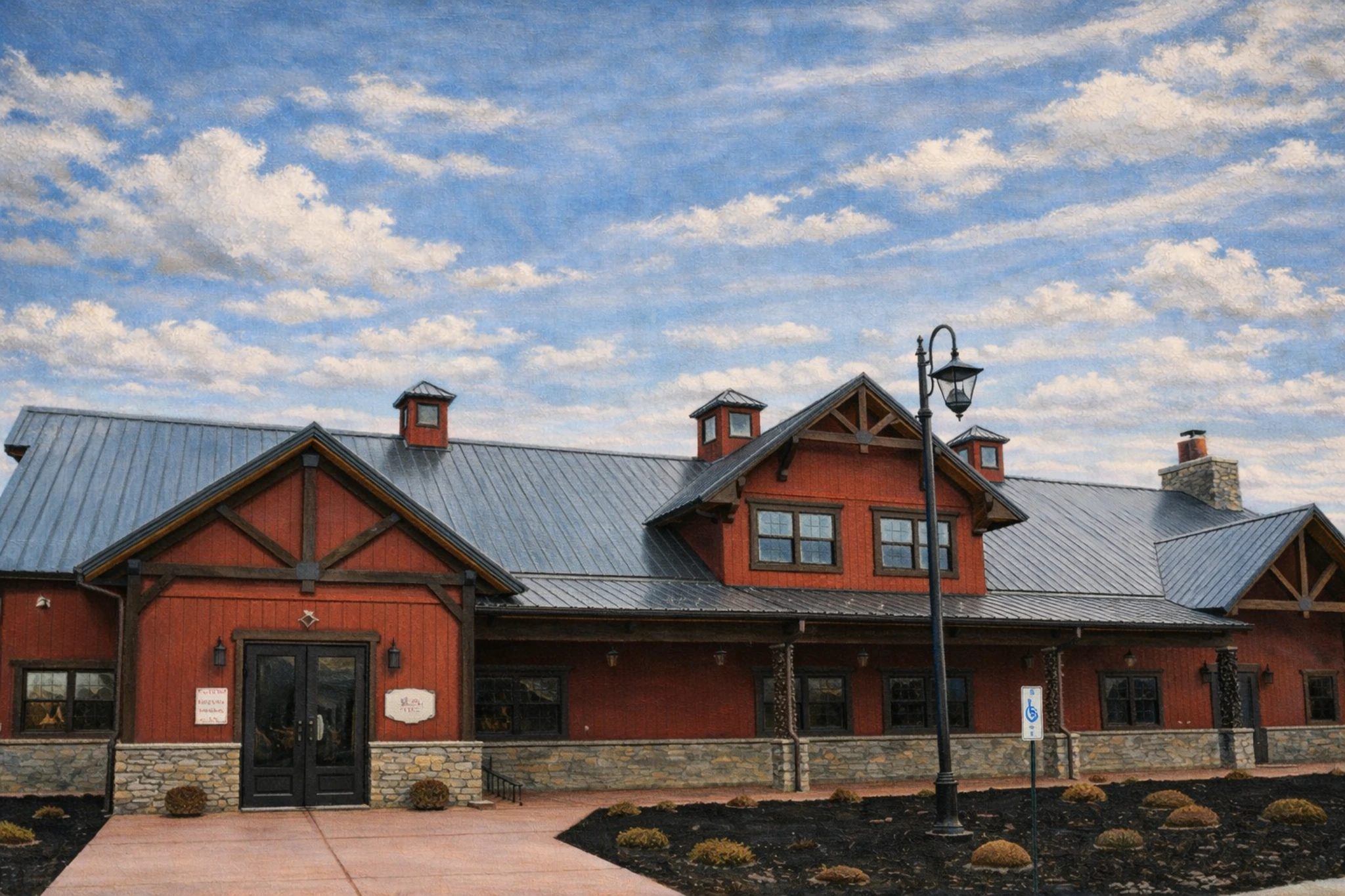 Exterior view of Jeptha Creed Distillery featuring a red barn-style building under a bright Kentucky sky.
