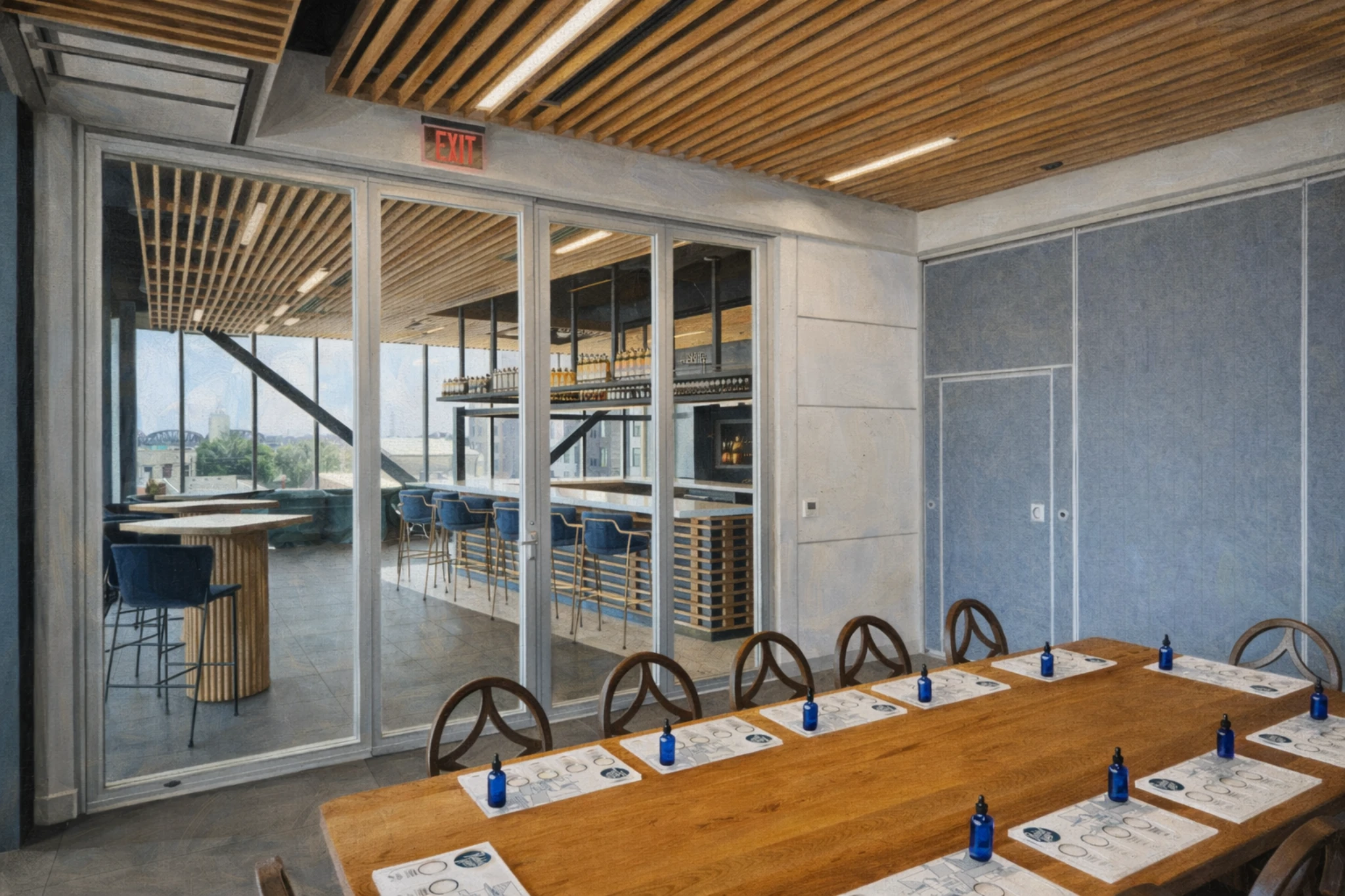 Private tasting room at Rabbit Hole Distillery with a long wooden table, place settings, and glass doors overlooking the bar area.